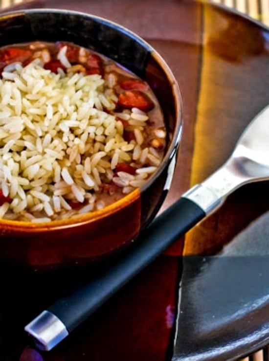Four Must-Try Recipes for Red Beans and Rice featured on Slow Cooker or Pressure Cooker at SlowCookerFromScratch.com