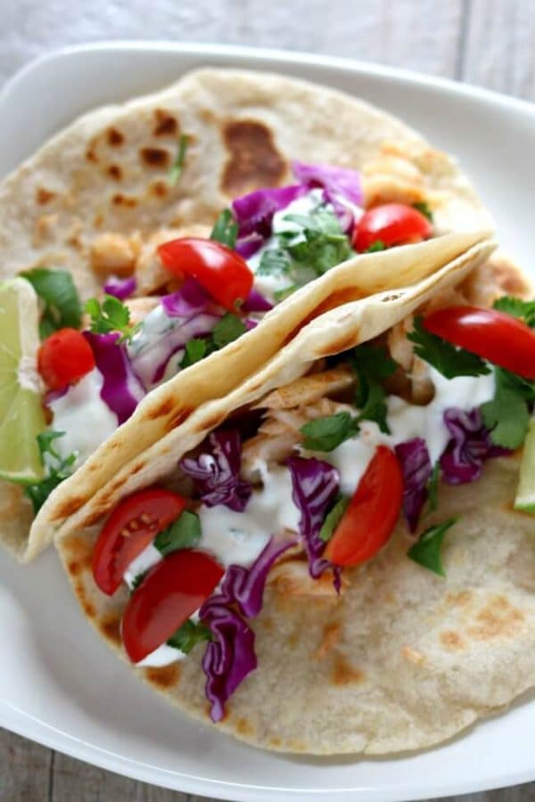 Alaska Cod Fish Tacos with Garlic Lime Sour Cream from 365 Days of Slow + Pressure Cooking