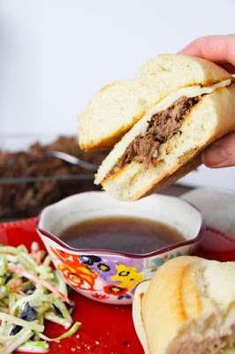 The BEST Slow Cooker or Instant Pot French Dip Sandwiches featured on SlowCookerFromScratch.com