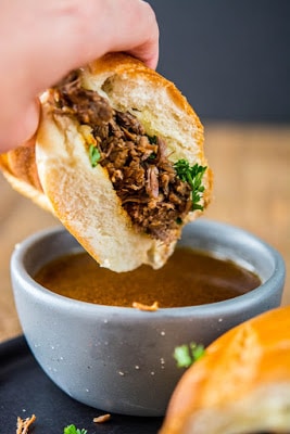 The BEST Slow Cooker or Instant Pot French Dip Sandwiches featured on SlowCookerFromScratch.com