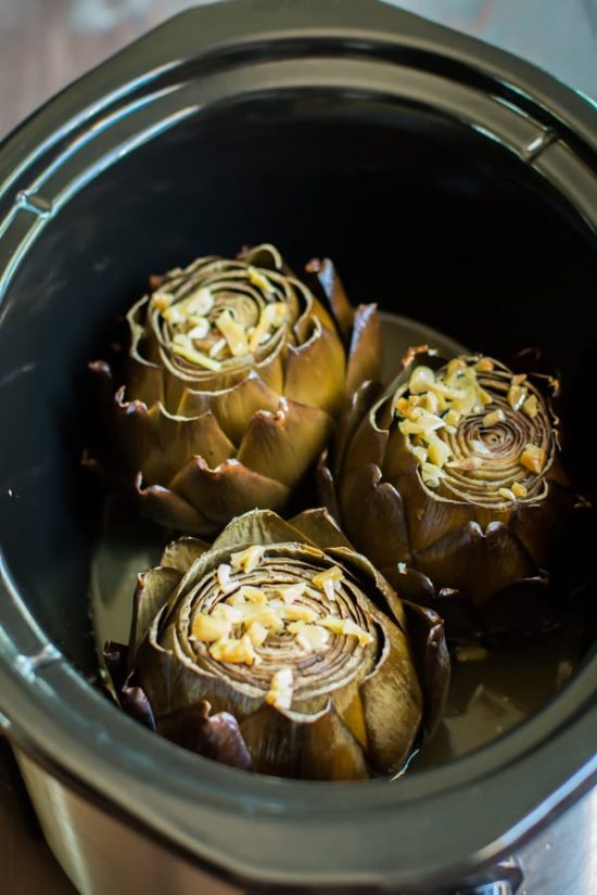 How to Cook Artichokes in the Slow Cooker or Instant Pot found on Slow Cooker or Pressure Cooker at SlowCookerFromScratch.com