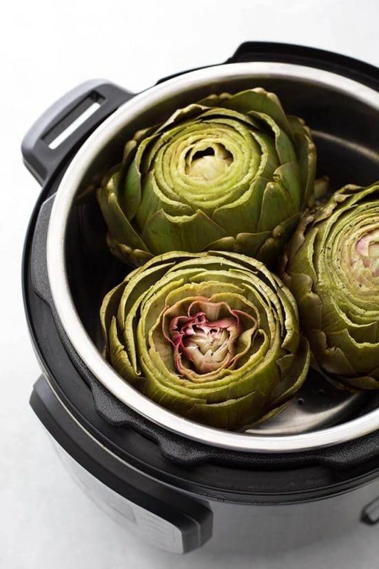 How to Cook Artichokes in the Slow Cooker or Instant Pot found on Slow Cooker or Pressure Cooker at SlowCookerFromScratch.com