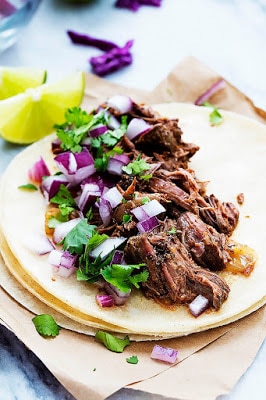The BEST Slow Cooker Beef Tacos from Food Bloggers found on SlowCookerFromScratch.com