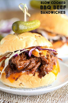 The BEST Slow Cooker Barbecued Beef Sandwiches with Homemade Sauce featured on SlowCookerFromScratch.com