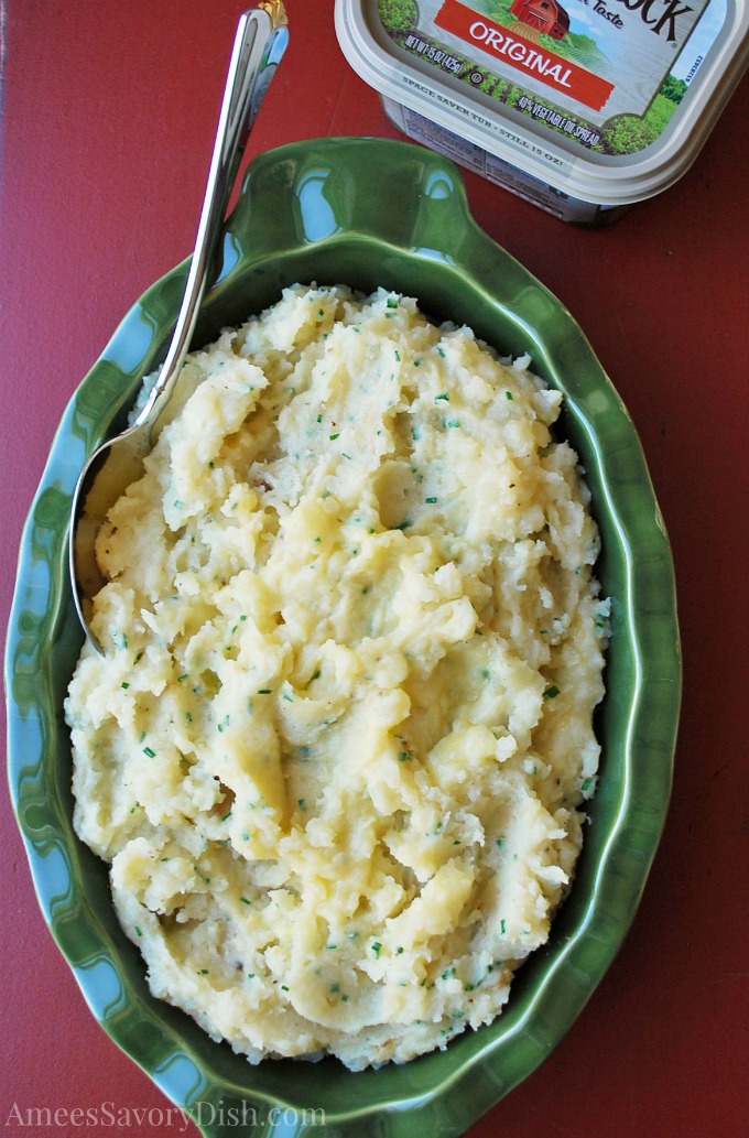 Slow Cooker White Cheddar, Garlic and Chive Mashed Potatoes from Amee's Savory Dish.
