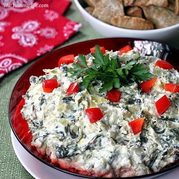 Healthy Slow Cooker Spinach Artichoke Dip from The Yummy Life