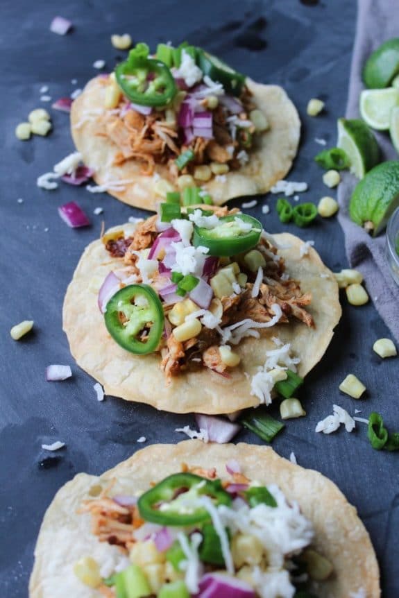 Four Fantastic Recipes for Chicken Tostadas featured on Slow Cooker or Pressure Cooker at SlowCookerFromScratch.com