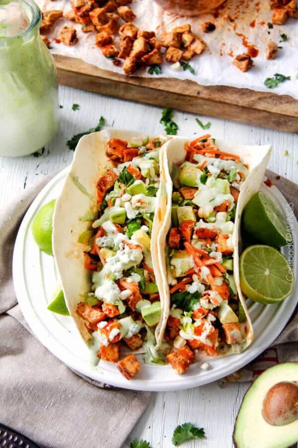 Buffalo Chicken Tacos with Blue Cheese Cilantro Ranch from Carlsbad Cravings shown on serving plate