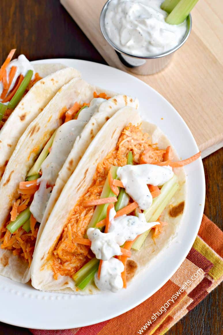 Slow Cooker Buffalo Chicken Tacos from Shugary Sweets shown on serving plate