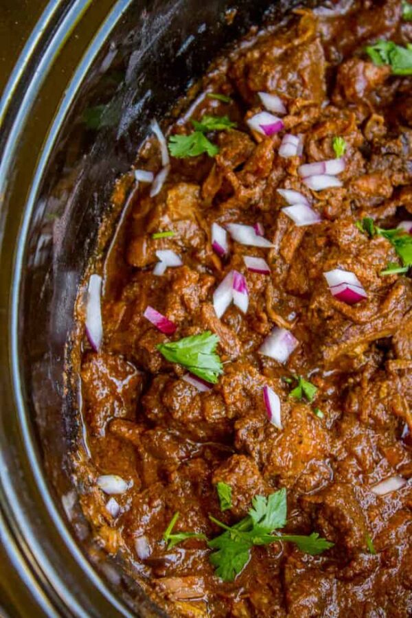 Slow Cooker Beef Curry from The Food Charlatan shown in slow cooker.