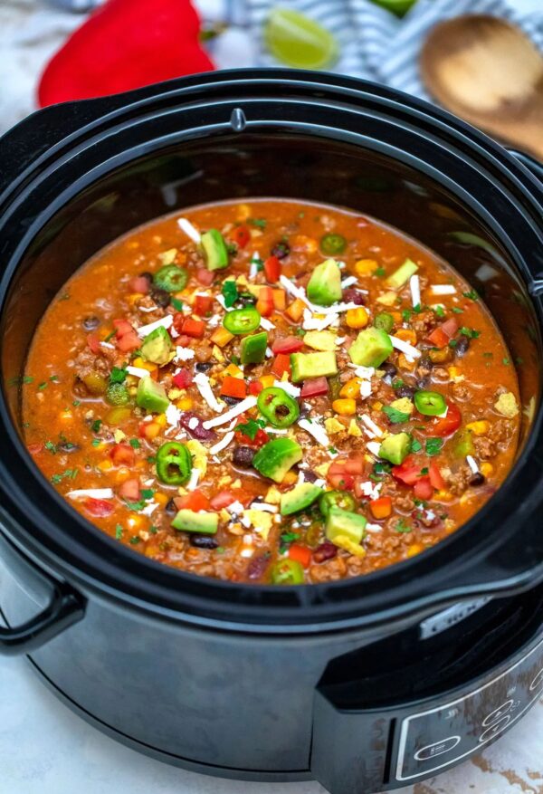Slow Cooker Tacos Soup from Sweet and Savory Meals shown in slow cooker