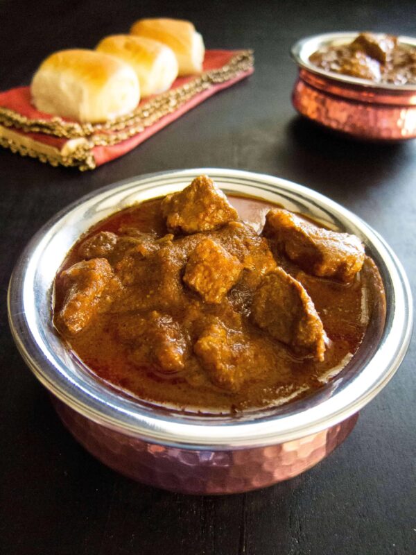 Instant Pot Chicken Vindaloo from Paint the Kitchen Red shown in serving bowl.