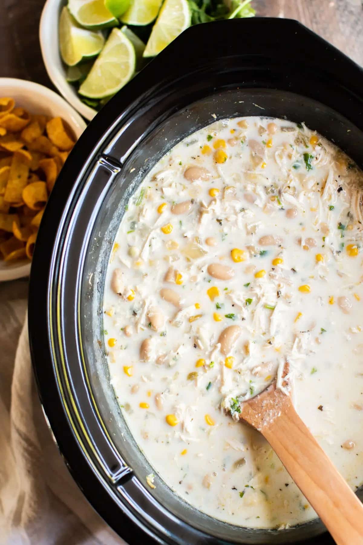 Slow Cooker White Chicken Chili from The Magical Slow Cooker shown in slow cooker.