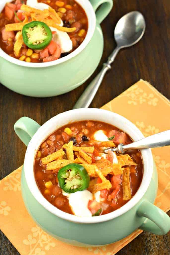 Slow Cooker Vegetarian Lentil Tortilla Soup from Shugary Sweets shown in two bowls