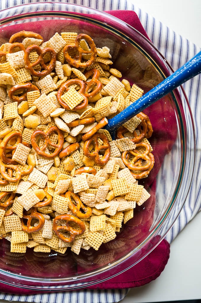 Slow Cooker Garlic Dill Snack Mix from Kitschen Cat shown in serving bowl.