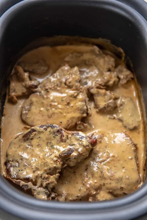 Slow Cooker Pork Chops with Creamy Herb Sauce from Slow Cooker Gourmet