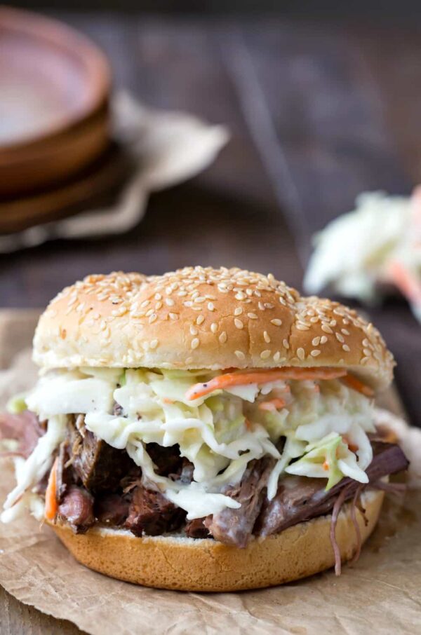 Slow Cooker Beef Sandwiches with Horseradish Coleslaw from I (Heart) Eating shown on plate.