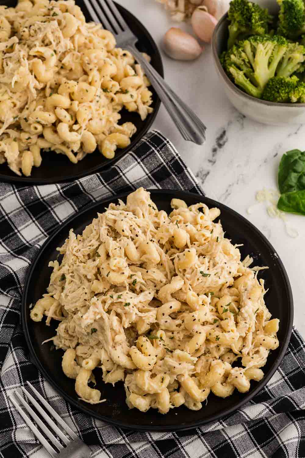 Slow Cooker Garlic Parmesan Chicken Pasta shown on serving plate.