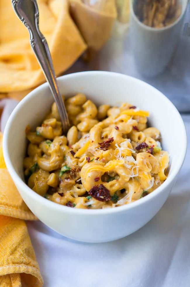 Pressure Cooker Pumpkin Mac-n-Cheese shown in serving bowl.