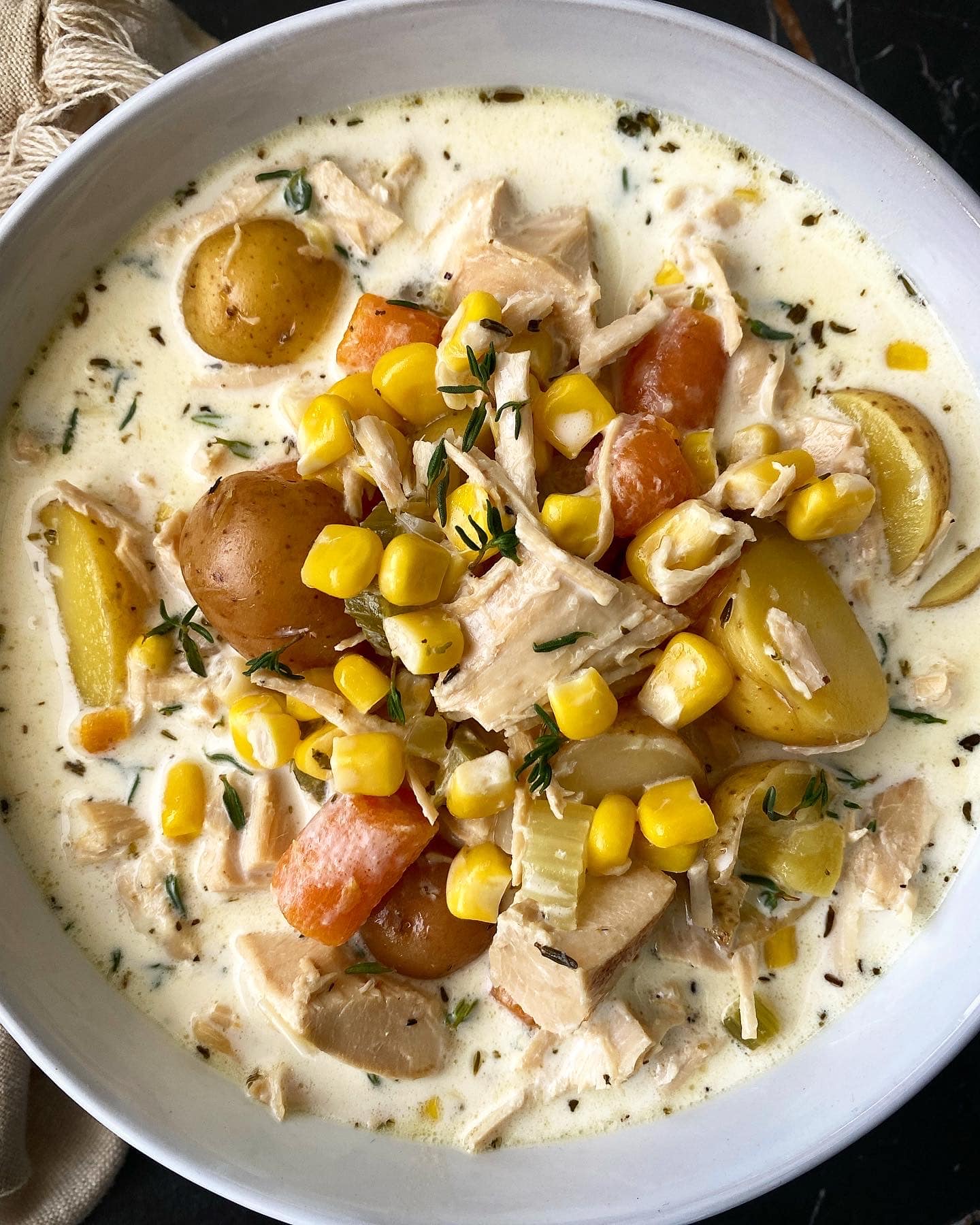 Slow Cooker Turkey Corn Chowder shown in serving bowl.